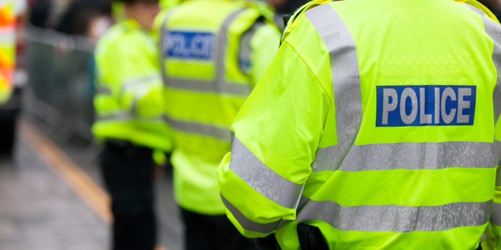 Police,In,Hi-visibility,Jackets,Policing,Crowd,Control,At,A,Uk
